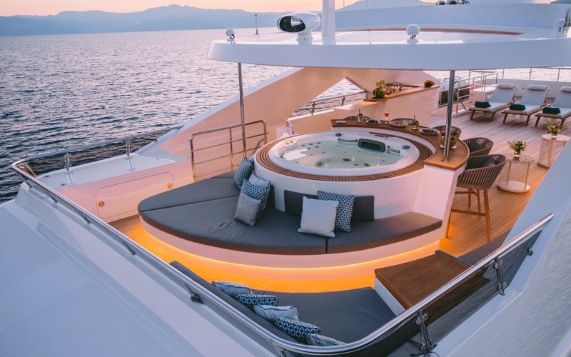 Luxury yacht interior and exterior design by AMK Architecture & Design, showcasing modern bespoke spaces, elegant cabins, premium materials, and high-end outdoor leisure areas.