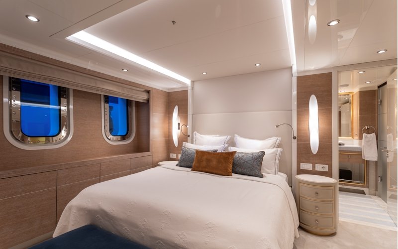 Luxury yacht interior and exterior design by AMK Architecture & Design, showcasing modern bespoke spaces, elegant cabins, premium materials, and high-end outdoor leisure areas.
