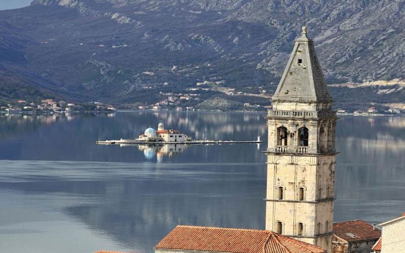 A beautiful landscape in Montenegro, featuring lush green hills, clear waters, and scenic natural beauty