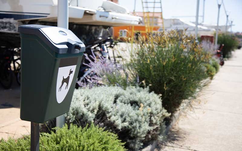 A 'Pet Friendly' marina with amenities for dogs, including designated pet areas and parking spot