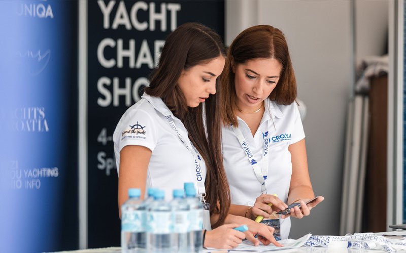 Two women in CROYA Yacht Charter Show