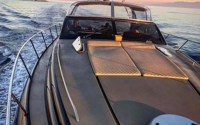 Close-up of premium leather upholstery on a yacht’s exterior seating, handcrafted by Dermavamvakakis