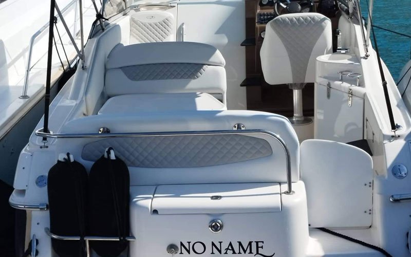 Close-up of premium leather upholstery on a yacht’s exterior seating, handcrafted by Dermavamvakakis