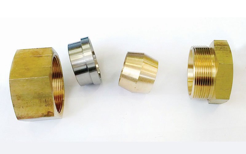 Precision-machined brass compression fittings manufactured by General Constructions Ifaistus.