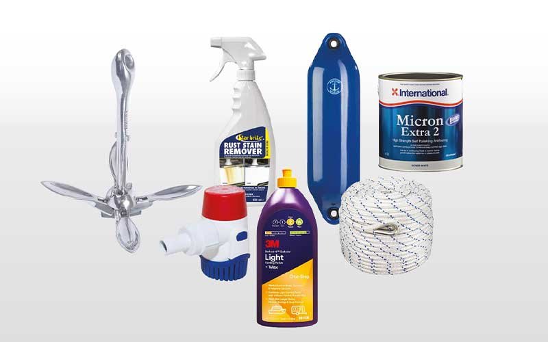 Assorted boating and marine maintenance supplies including a folding anchor, rust stain remover spray, boat fender, antifouling paint can, rope, marine water filter, and 3M cleaner and wax