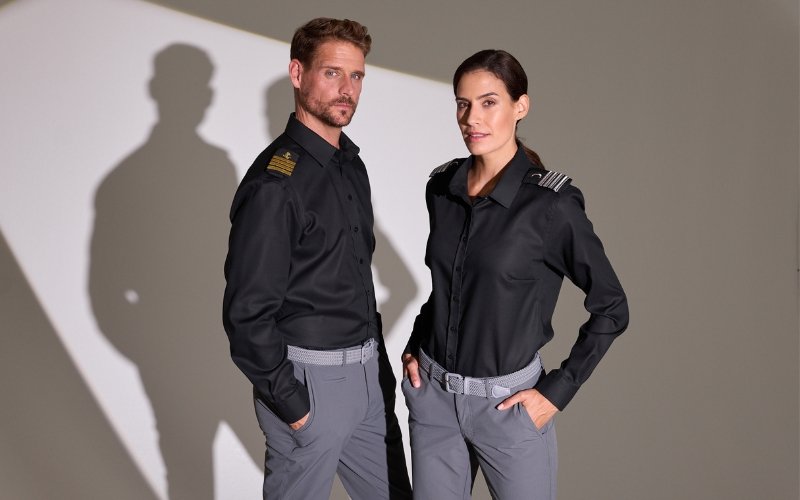 Men and women wearing Marinepool premium maritime and sailing apparel, showcasing professional nautical clothing designed for performance, comfort, and modern style.