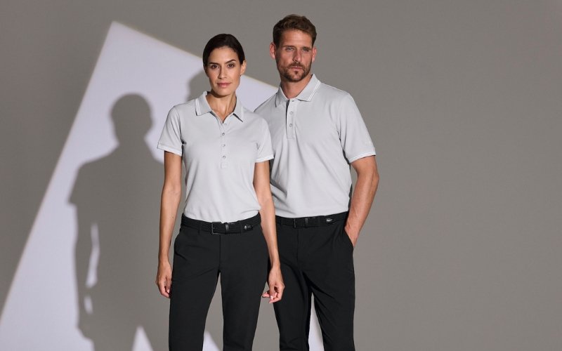 Men and women wearing Marinepool premium maritime and sailing apparel, showcasing professional nautical clothing designed for performance, comfort, and modern style.