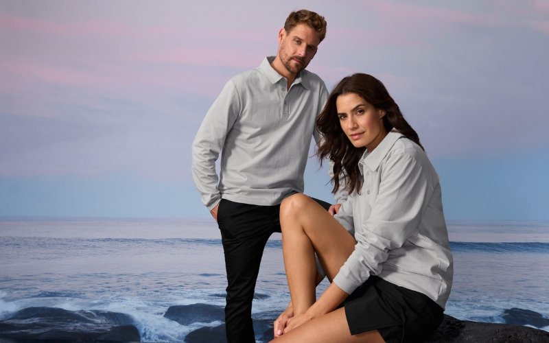 Men and women wearing Marinepool premium maritime and sailing apparel, showcasing professional nautical clothing designed for performance, comfort, and modern style.