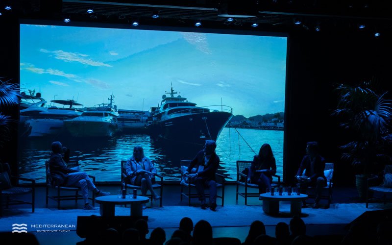 Superyacht industry leaders speaking on stage at the Mediterranean Superyacht Forum conference
