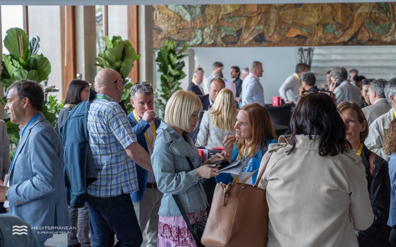 Superyacht executives networking and discussing business opportunities at the Mediterranean Superyacht Forum