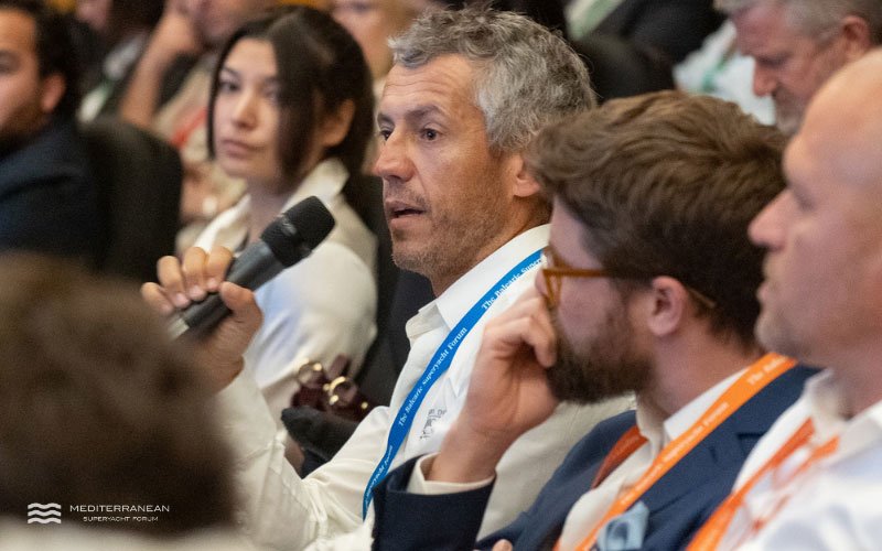 Delegate participating in audience discussion at the Mediterranean Superyacht Forum conference