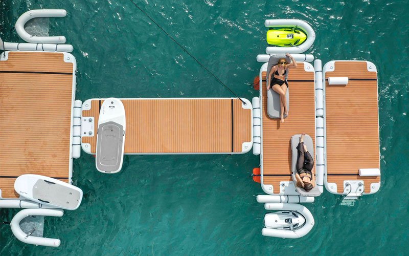 Inflatable modular platforms by NAUTIBUOY MARINE, creating extra space on the water for relaxing, watersports, and yacht-side leisure.
