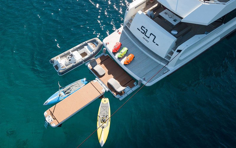 Inflatable modular platforms by NAUTIBUOY MARINE, creating extra space on the water for relaxing, watersports, and yacht-side leisure.
