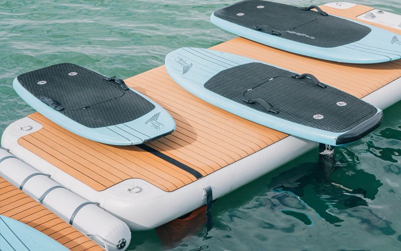 Inflatable modular platforms by NAUTIBUOY MARINE, creating extra space on the water for relaxing, watersports, and yacht-side leisure.