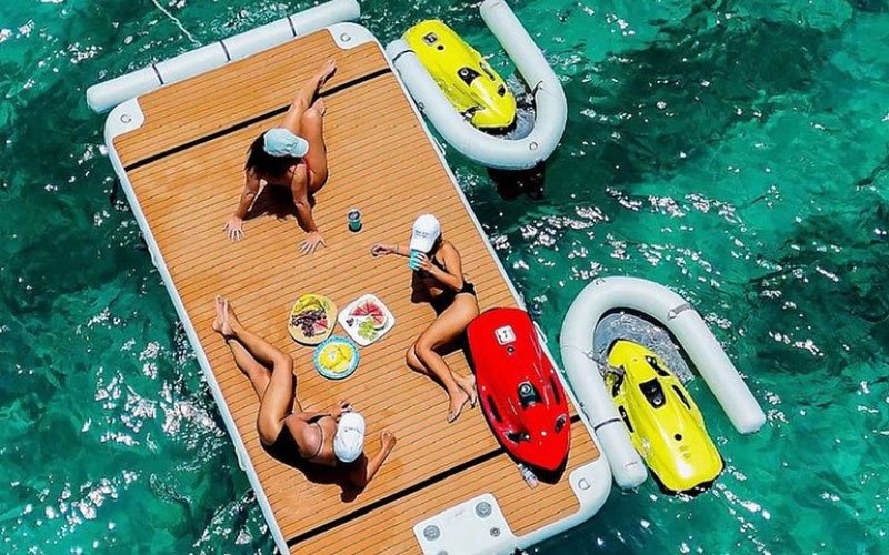 Inflatable modular platforms by NAUTIBUOY MARINE, creating extra space on the water for relaxing, watersports, and yacht-side leisure.