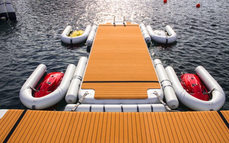 Inflatable modular platforms by NAUTIBUOY MARINE, creating extra space on the water for relaxing, watersports, and yacht-side leisure.