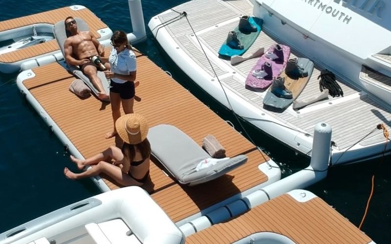 Inflatable modular platforms by NAUTIBUOY MARINE, creating extra space on the water for relaxing, watersports, and yacht-side leisure.