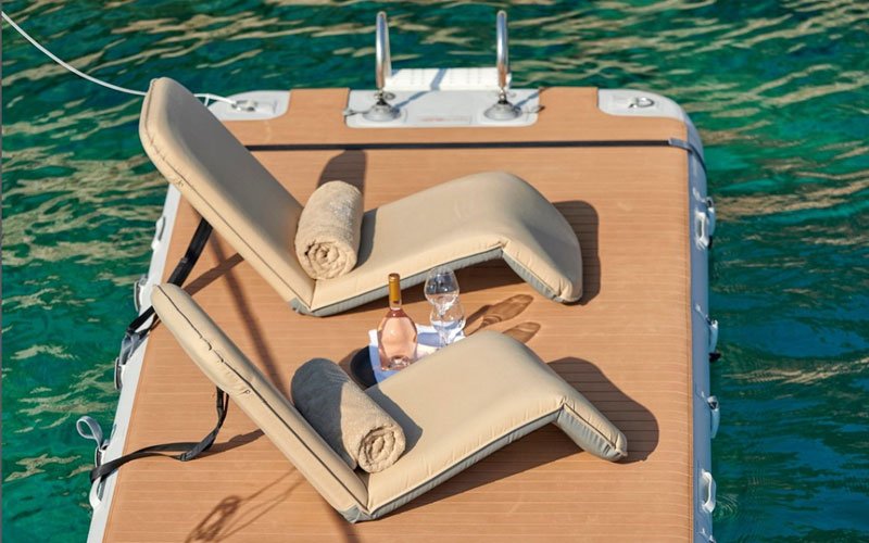 Inflatable modular platforms by NAUTIBUOY MARINE, creating extra space on the water for relaxing, watersports, and yacht-side leisure.