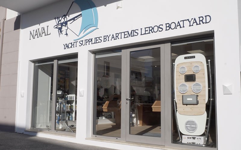 The storefront of Naval Store Yacht Supplies by Artemis Leros Boatyard, with the shop's sign clearly visible