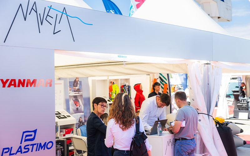 NAVELA exhibition booth welcoming visitors interested in marine equipment and boating solutions.