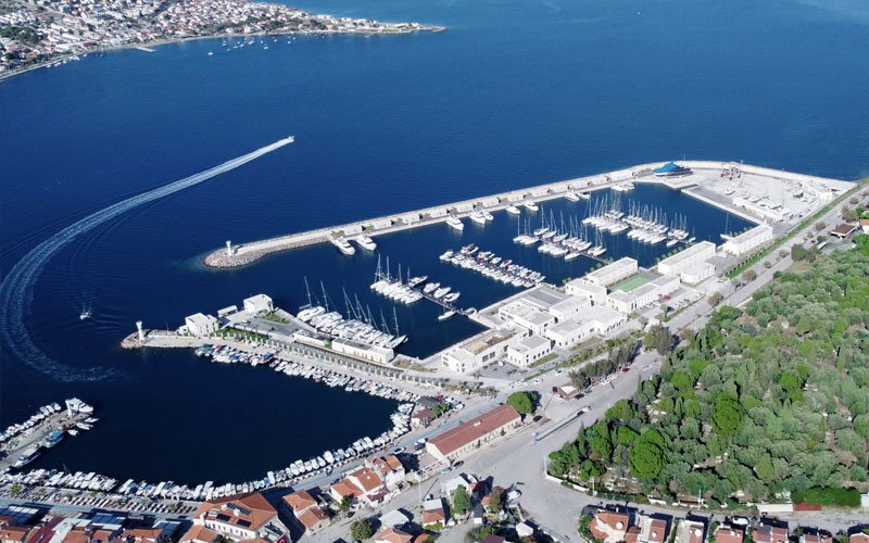 Panoramic View of Oasis Marina Yeni Foca. Beautiful yachts lined up and from behind the buildings and facilities of the marina