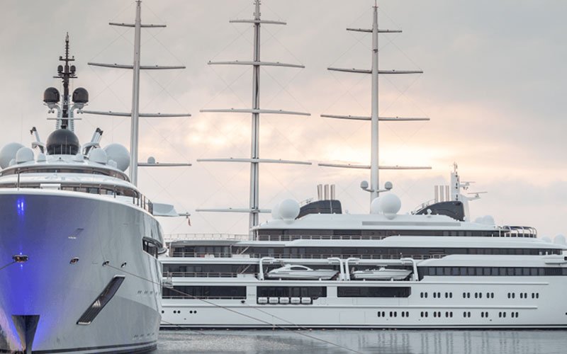 Luxury marina facilities managed by OCIBAR Group featuring superyachts, modern berths, waterfront promenades, and premium coastal infrastructure in top Mediterranean destinations.