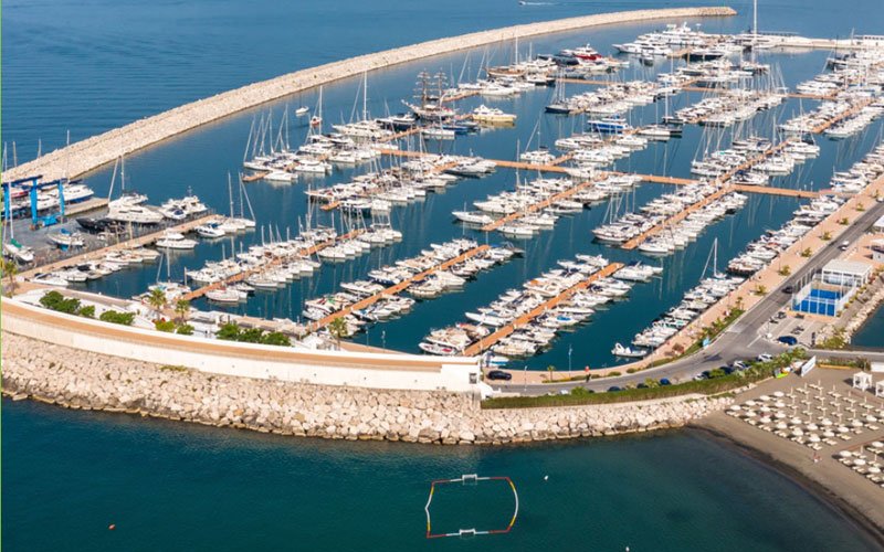 Luxury marina facilities managed by OCIBAR Group featuring superyachts, modern berths, waterfront promenades, and premium coastal infrastructure in top Mediterranean destinations.