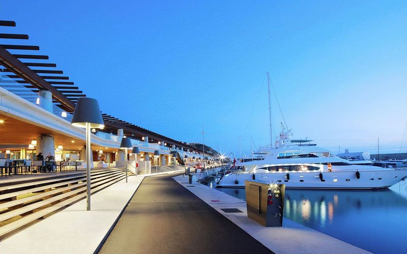 Luxury marina facilities managed by OCIBAR Group featuring superyachts, modern berths, waterfront promenades, and premium coastal infrastructure in top Mediterranean destinations.