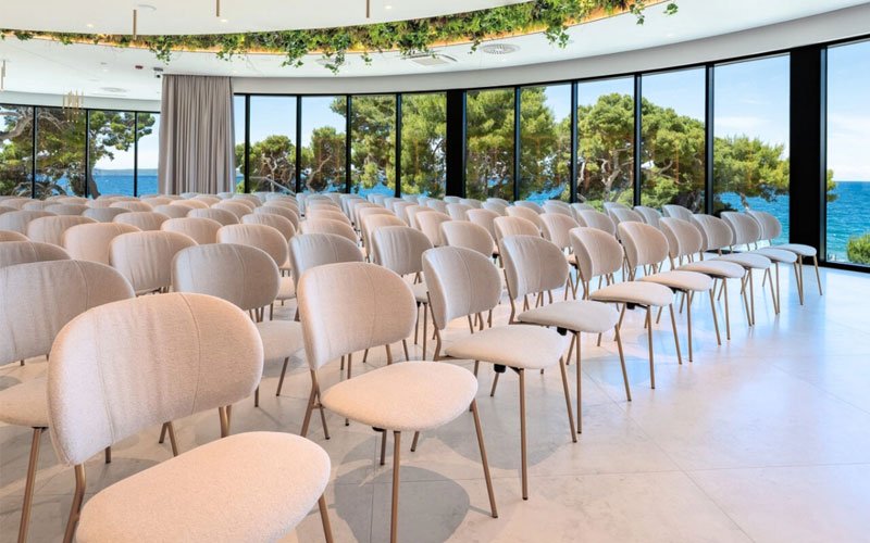 Conference seating setup at Adriatic Nautical Business Forum with modern chairs and sea view venue